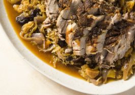 Chef Olia Hercules cooks Borsch with Duck and Prunes on "Milk Street" 1 slowroastedporksauerkrautapplesdriedfruitshe9c367d0174af7e1000be1c011344417